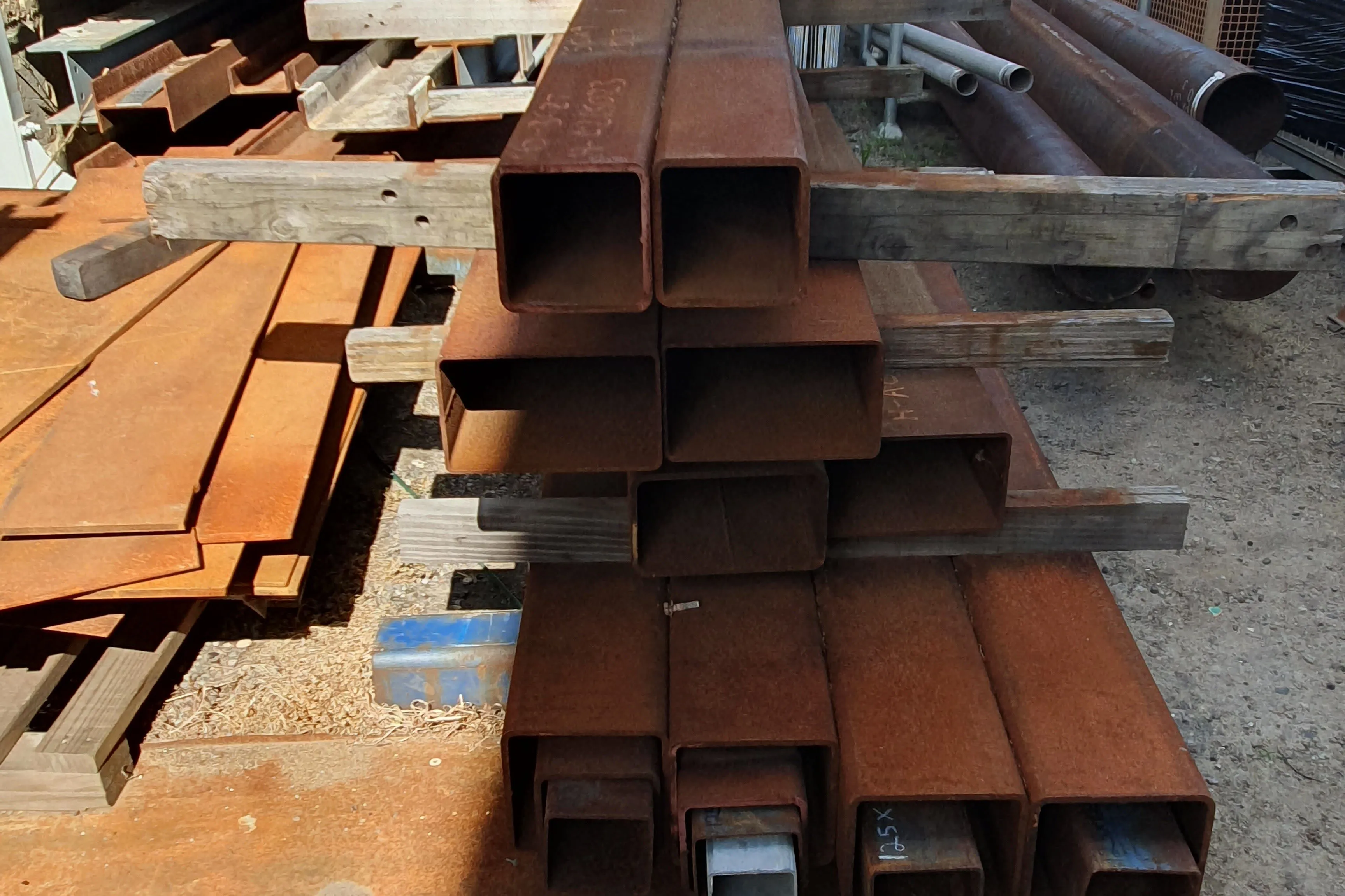 Stack of large square and rectangular hollow steel sections at the GoRecycle Wangara yard
