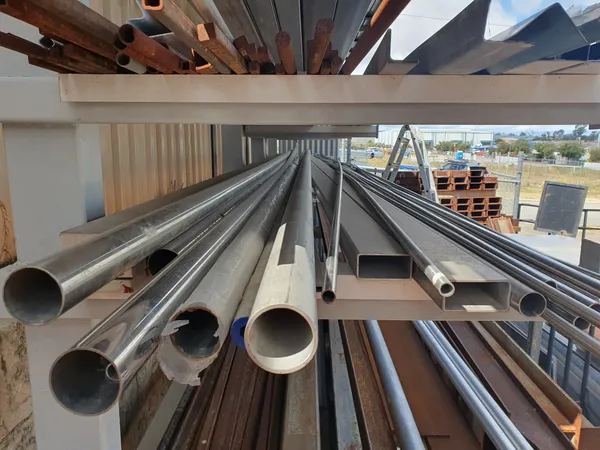 Long lengths of stainless steel tube on a rack